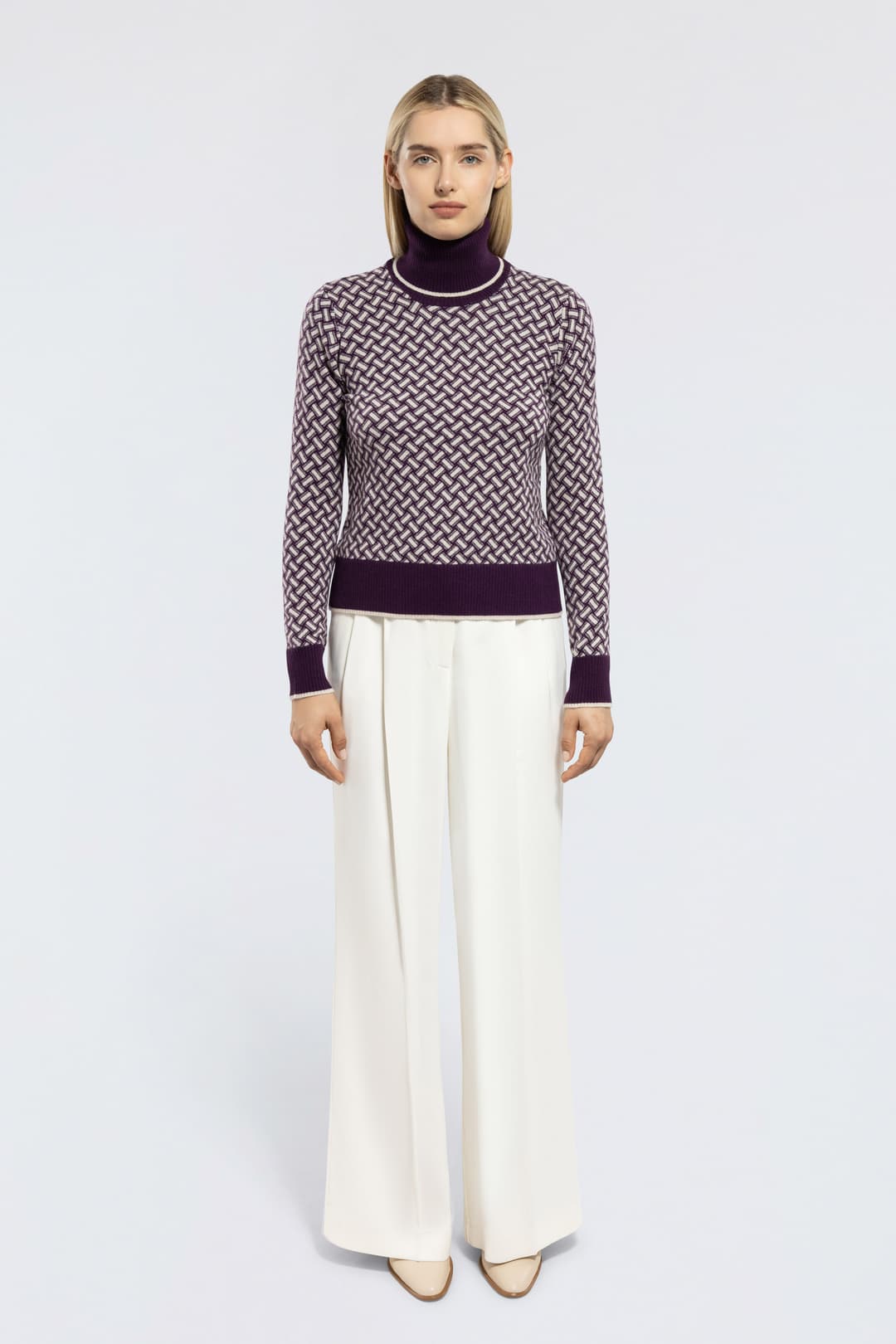Razor Blade Turtleneck Sweater